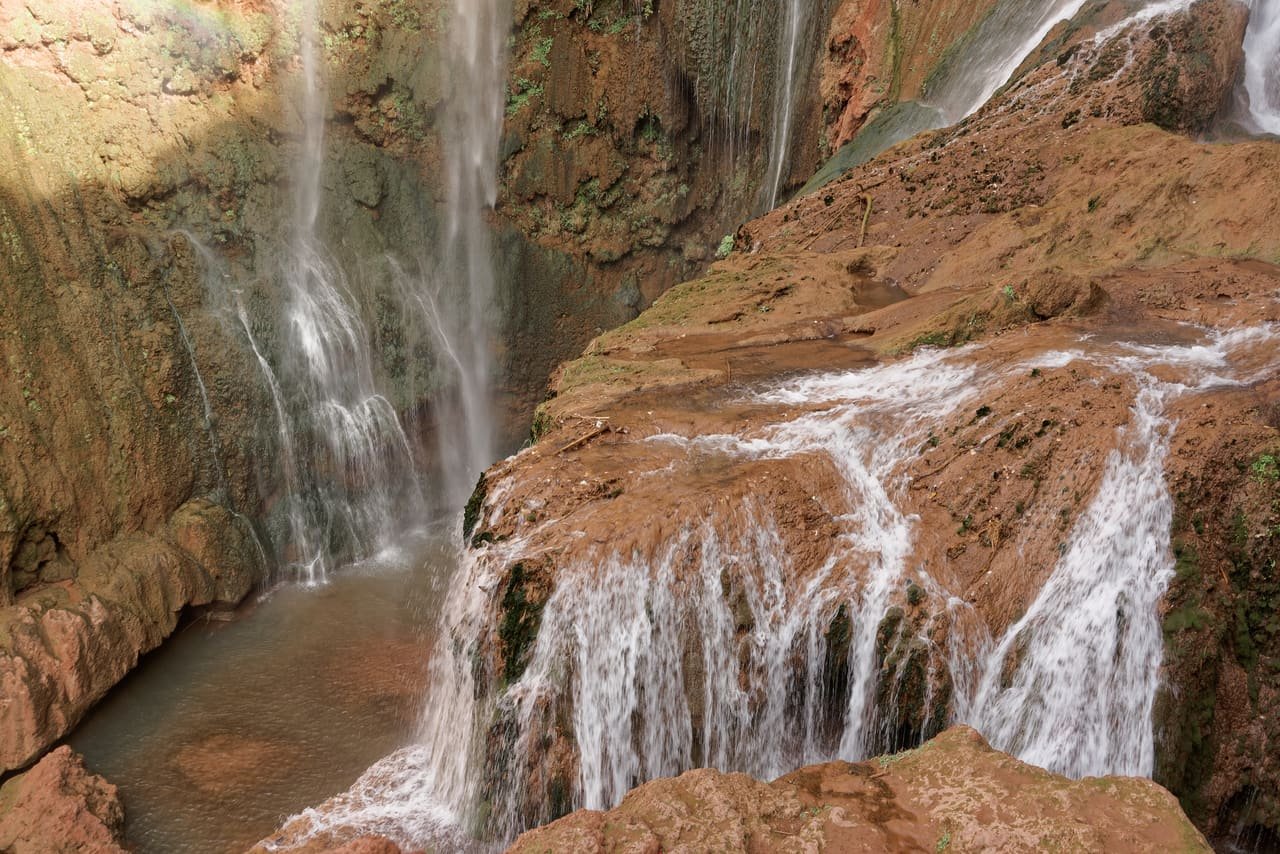 The Ouzoud falls dropping in tiers through the olive groves